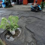 Pothole-riddled arterial roads make commute a nightmare for ...